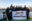 Crew der Humanity 1 mit Plakat "Free the Justice Fleet"